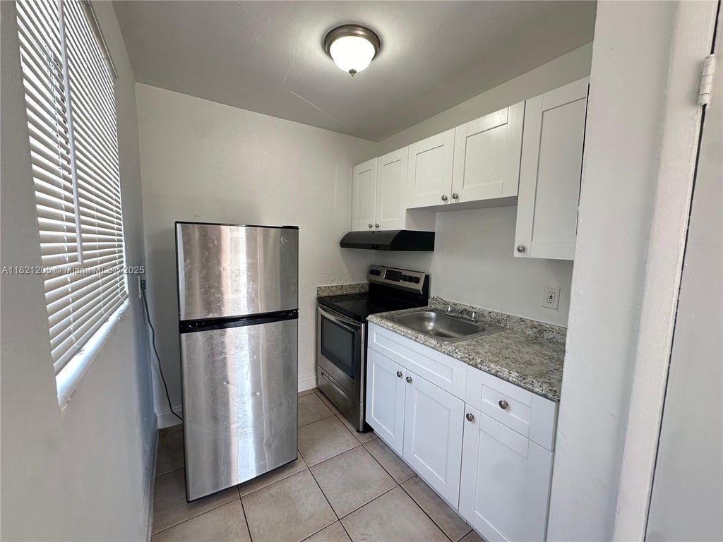 Photo of 405 NW 5th St #1, Pompano Beach, FL 33060 (MLS # A11821205)