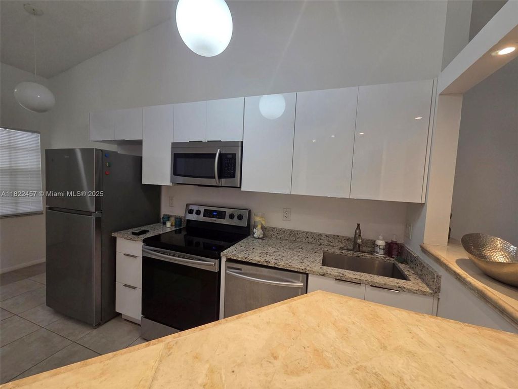 Photo of 3686 NW 83rd Ln #3686, Sunrise, FL 33351 (MLS # A11822457)