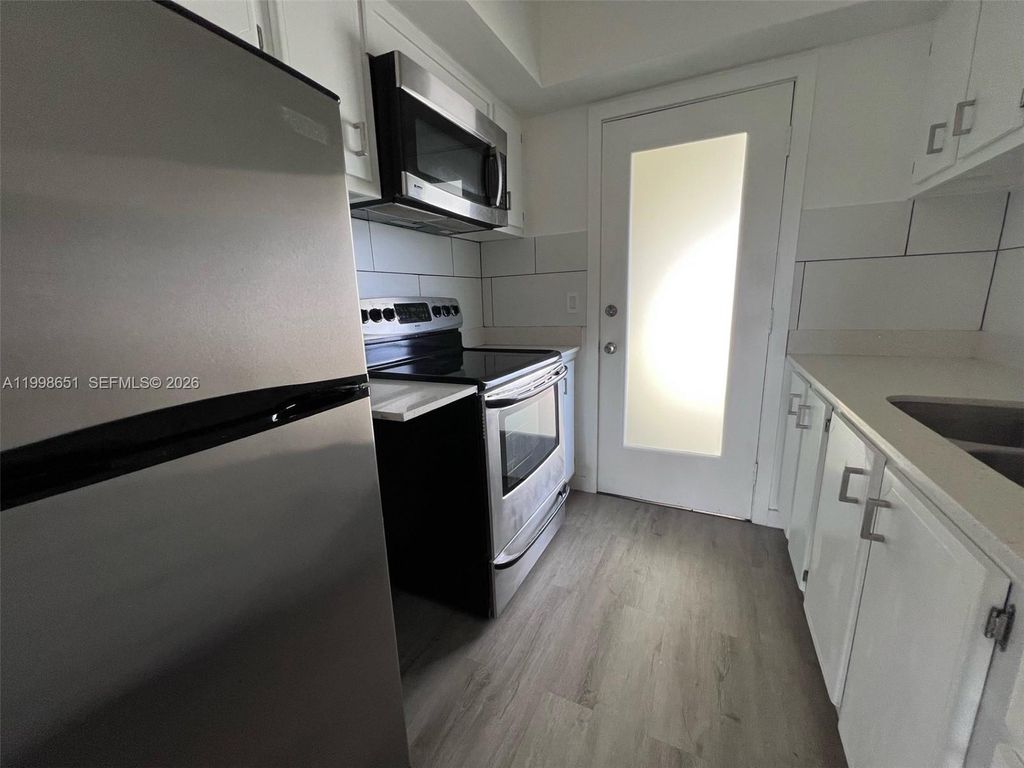 Photo of 1350 E Sample Rd #306, Pompano Beach, FL 33064 (MLS # A11998651)