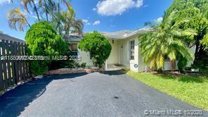 Amazing property, in excellent location in Doral, gated community, with a huge clubhouse that includes golf. 3 bedrooms and two bathrooms in a single story house, with parking capacity for 6 cars, large patio with lots of trees and shade. Excellent opportunity for people who want to live quietly.