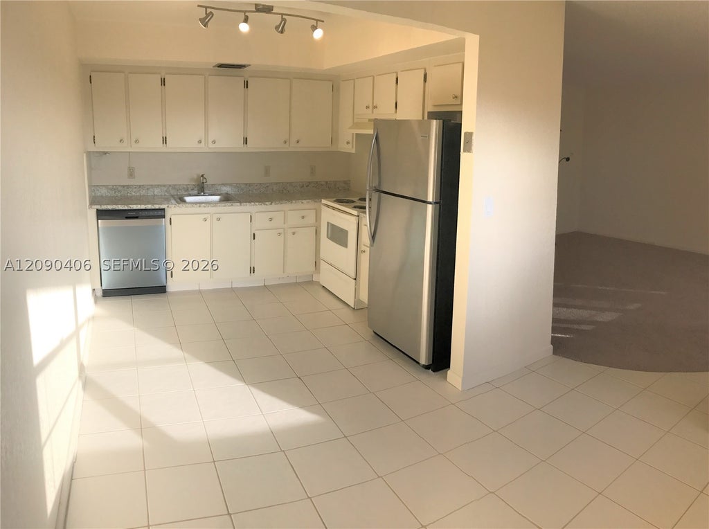Photo of 1902 Bermuda Cir #D4, Coconut Creek, FL 33066 (MLS # A12090406)