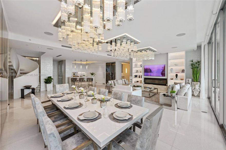 Spectacular brand new, two story penthouse! Completely furnished, Floor to ceiling intercoastal and ocean views in the prestigious Parque Towers. Comprised of a total 6,854 sf (4,058 sf Interior + 2796 sf terraces with private glass pool) features 4 bedrooms, 4.5 bathrooms with open floor concept, $2,600,000 was spent on upgrades & furniture. Italian custom cabinets, onyx floor, Bosch & Subzero appliances, custom closets, complete smart home and audio throughout the condo, 4 parking spots - of 2 assigned & 2 valet spots, private storage. SELLER FINANCING AVAILABLE SUBJECT TO SELLER APPROVAL. Guest suites are available for owner’s guests, 5-star luxury amenities including concierge, 24-hour security & valet, resort style pool, cigar
lounge, bistro & media room.