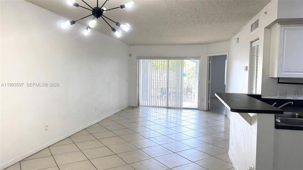 Photo of 9640 NW 2nd St #5-204, Pembroke Pines, FL 33024 (MLS # A11993597)