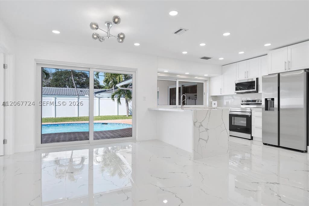 Photo of 5711 NE 20th Ter, Fort Lauderdale, FL 33308 (MLS # A12067724)