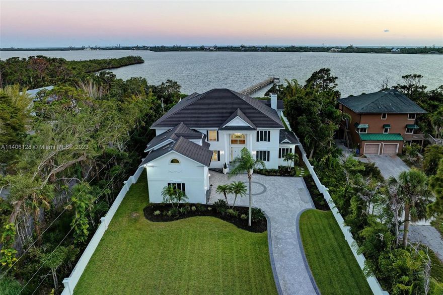 Luxury and waterfront living converge in this captivating 5-bedroom estate nestled in Englewood Gardens. Breathtaking vistas of Lemon Bay, impeccable craftsmanship, and timeless elegance. Meticulous gardens, regal interiors, and enchanting water views create unparalleled luxury. Fully furnished, this haven boasts a magnificent staircase, soaring ceilings, opulent marble/wood flooring. The spacious kitchen with water-views and high-end appliances delights. The main suite epitomizes luxury. Stately office, well-equipped gym enhance productivity and wellness. Outside, a waterfront pool deck, private dock. Easy boating access and proximity to Sarasota. This property embodies waterfront living and is sold fully furnished. Immerse yourself in beauty and tranquility.