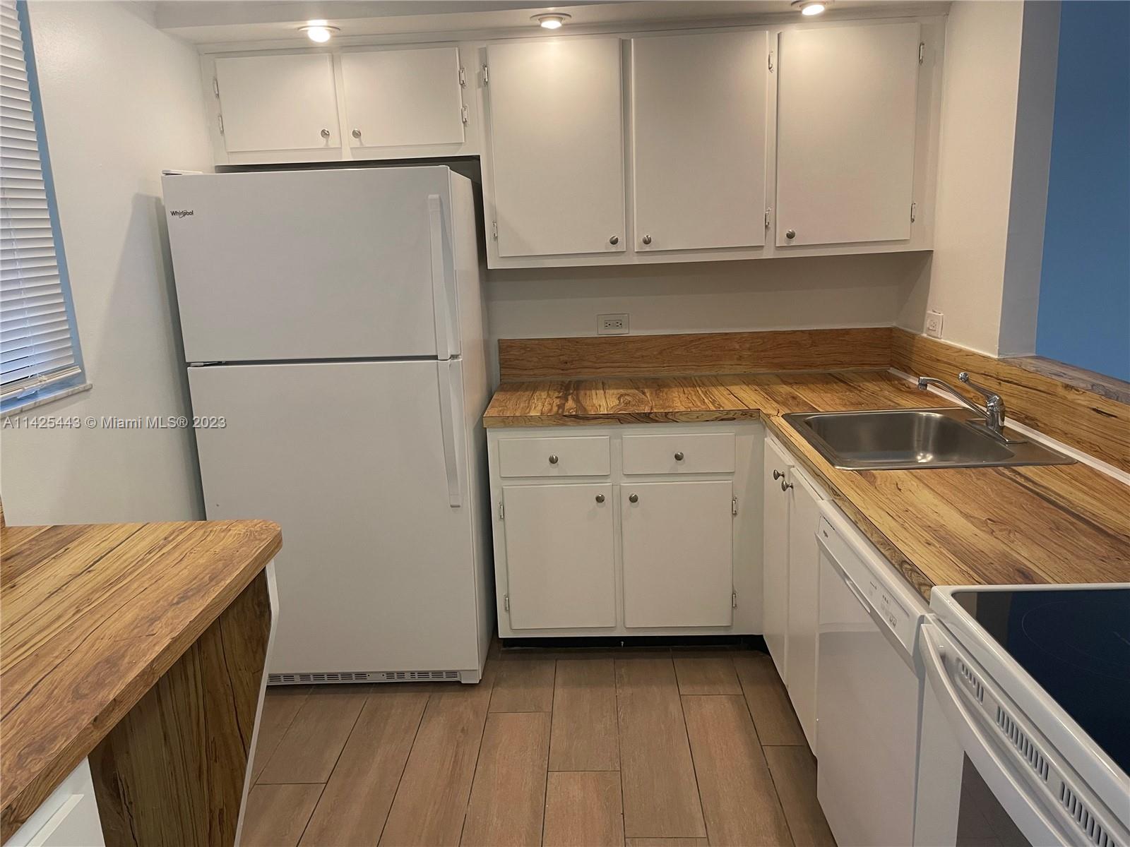 Gorgeously appointed large 2/2 light filled condo in top location of Gardens of Kendall. Huge size bedrooms with walk in closets. 9" ceilings and large windows for plenty of light. Freshly painted, Brand new floors in bedrooms, brand new bathroom vanities. The managed community offers pool, tennis courts and ample parking area. Do not miss the opportunity to live in this fabulous location across from shops, restaurants, Miami Dade College and easy access to expressways, Turnpike Northbound and Southbound. Ready to move in.