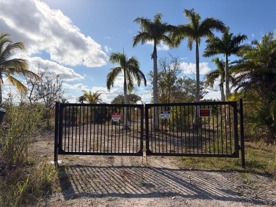 SELLER FINANCING AVAILABLE Beautiful and mostly cleared 5 acres to farm or build your home or lease (permitted). Property has been mostly cleared, private front entrance gated and has septic tank.  Road to property has also been cleared. Beautiful palm trees, beautiful growing location with many uses that are allowed.  Property is easy accessed off Ingram Highway.