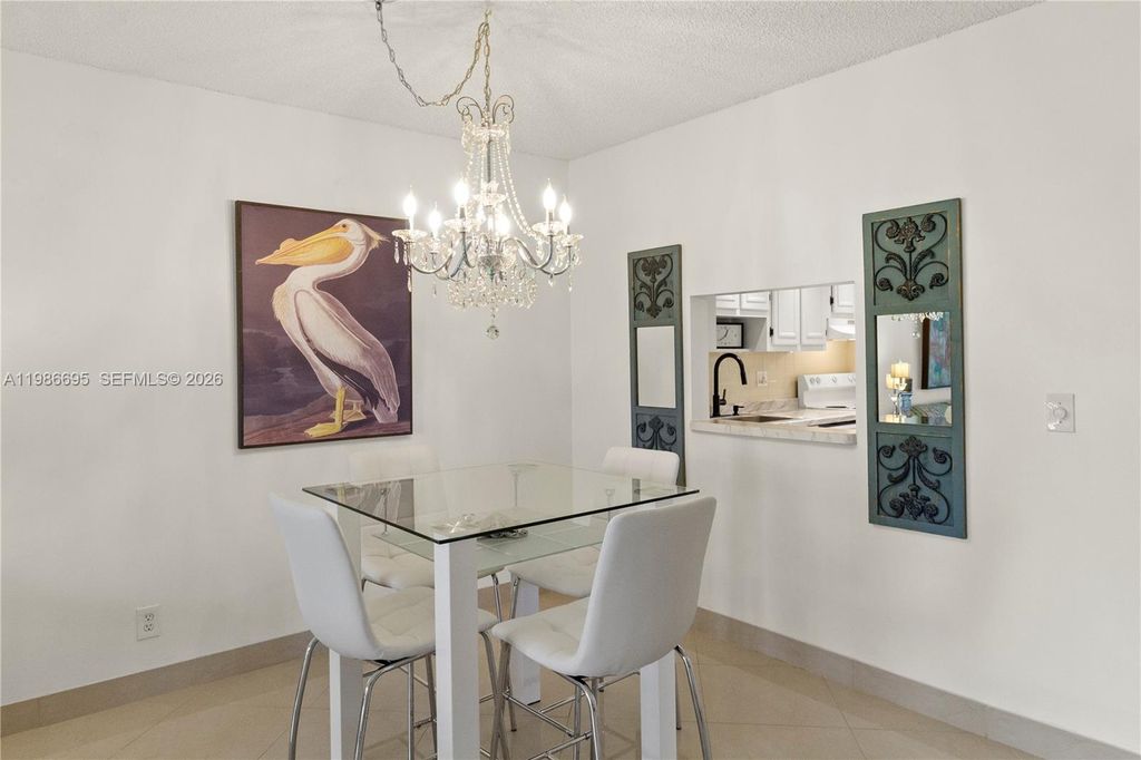 Photo of 3 Abbey Ln #101, Delray Beach, FL 33446 (MLS # A11986695)