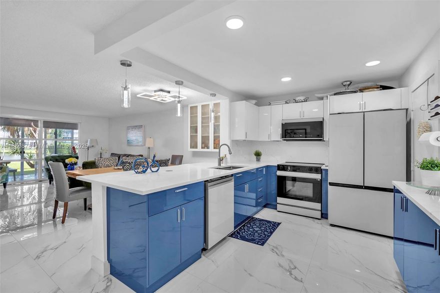 Impeccable, turnkey lakefront corner condo—fully remodeled and ready for move-in. Enjoy a bright, open kitchen with impact windows and doors, sleek modern finishes, designer lighting, and the convenience of an in-unit washer/dryer. Relax at the heated pool or entertain in the clubhouse featuring a full kitchen, BBQ area, and new roof. Major building upgrades are complete: 40-year inspection, new fire alarm, roof, elevator, and resurfaced parking. Perfectly located just 2 miles from the beach and minutes to shopping, dining, casinos, Hollywood Broadwalk, airports, and more. Quiet, well-kept 55+ community with ample parking. $450/mo maintenance, with reserves. No lease first 2 years.