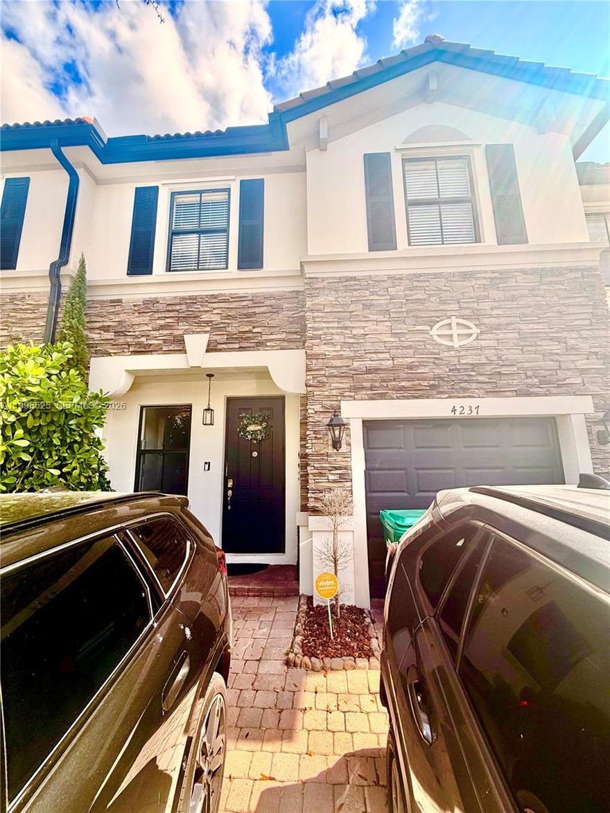 beautifully renovated 2-story townhouse located in Interlaken Community. Completely renovated, kitchen with spacious island and quartz counter with new and modern Samsung brand appliances, touch screen refrigerator with access YouTube, Spotty, etc. The first-floor tile is 32x32 marble, the second-floor tile is waterproof. Spacious living room that allows the view from the entrance to the end of the patio that overlooks a beautiful lake. Beautiful and large patio. 1/2 bathroom and garage renovated. Large master room with walking closet and bathroom, comfortable laundry with new washer & dryer Samsung, 2 rooms more spacious and bathroom. 2 parking spaces, 1 garage and guest parking, low fee maintenance.