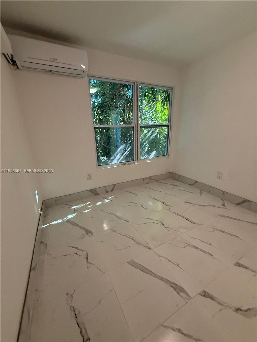 Photo of 1652 Madison St #7, Hollywood, FL 33020 (MLS # A11958867)