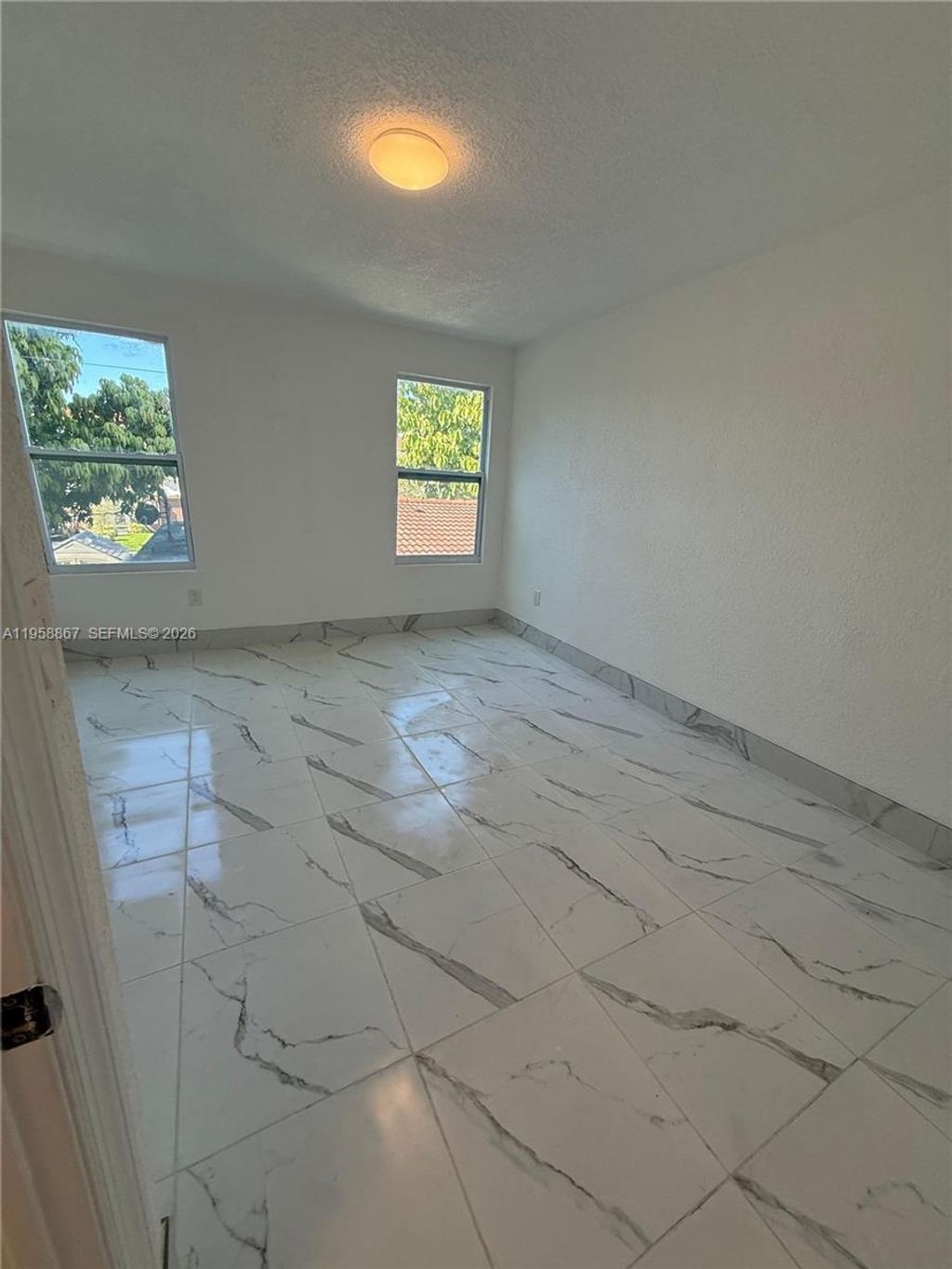 Photo of 1652 Madison St #7, Hollywood, FL 33020 (MLS # A11958867)