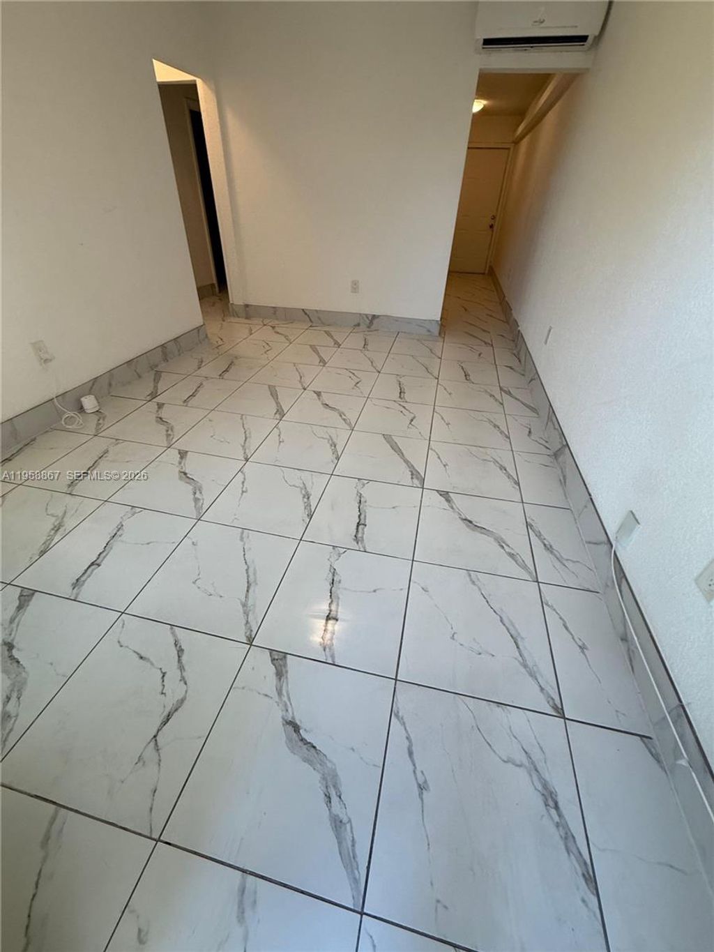 Photo of 1652 Madison St #7, Hollywood, FL 33020 (MLS # A11958867)