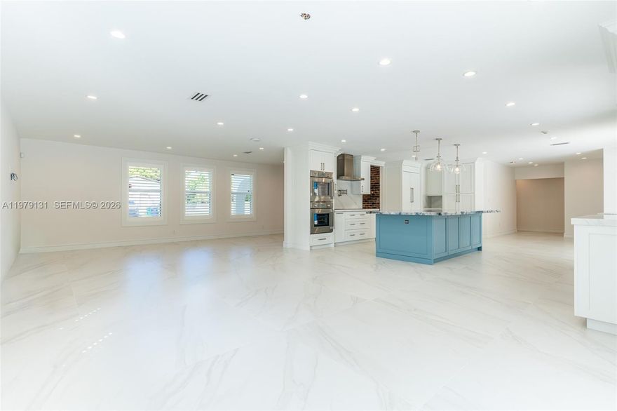 Discover an extraordinary residence—fully reimagined, meticulously renovated, and never occupied since completion. Crafted with uncompromising quality and state-of-the-art features!

Step into an expansive, open floor plan highlighted by 48x48 porcelain tile, all-new ductwork, PVC piping, impact windows and doors, LED lighting, and a premium Araknis wireless network with CAT-6 hardwiring  for seamless connectivity.

The chef’s kitchen is a true showpiece, boasting a grand center island, marble countertops, and a full suite of Thermador stainless steel appliances—double ovens, side-by-side refrigerator, warming drawer, water dispenser, and double-drawer dishwasher—paired with custom cabinetry designed for both elegance and function. 
Spa-inspired bathrooms  including a primary suite with an air-jet soaking tub and designer shower wall. All bedrooms feature California Closets, and the home includes a spacious utility room with sink !

Outdoors, enjoy a generous bricked patio and sparkling pool overlooking a tranquil waterway &, fully fenced garden—your private retreat. Additional upgrades include over  $50K in energy-saving solar panels, new Ring spotlight cameras, and a full alarm system. Renovations were completed with ADA-conscious design in mind, and architectural plans for a new covered front entrance are included.
Perfectly located within walking distance of top-rated schools and parks, this rare offering is truly move-in ready.—your dream home awaits.