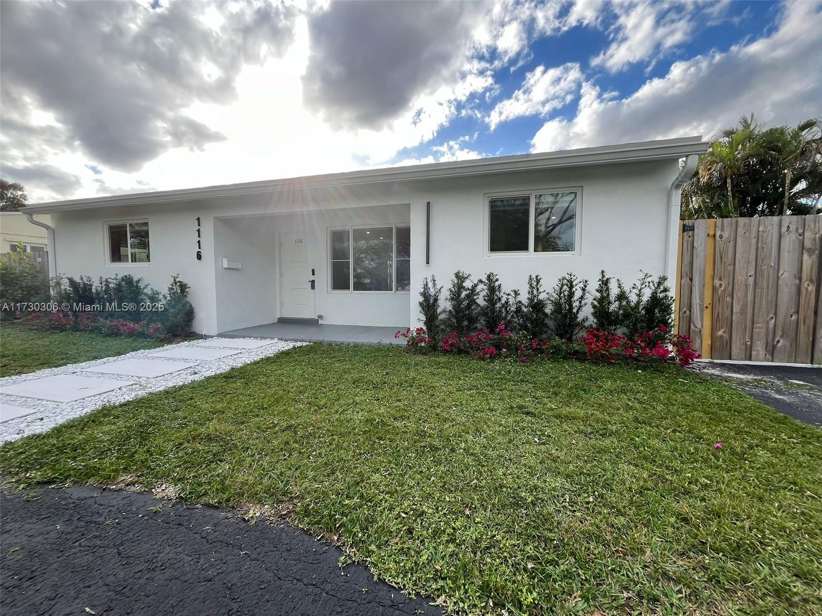 Modern and Stylish 2025 renovation, A/C & Roof 5 years. Impact windows, Window Treatment, New Landscaping with brand new synthetic grass in the backyard as well as clusia all around the fence , Ceramic floor throughout the entire house, Smart Thermostat and Main Lock, USB & Type C outlets through the house, 6 inches height baseboards, Renovated the house 2 bathrooms with temper glass doors in showers. New and modern kitchen with countertop outlets for easy laptop work. space.