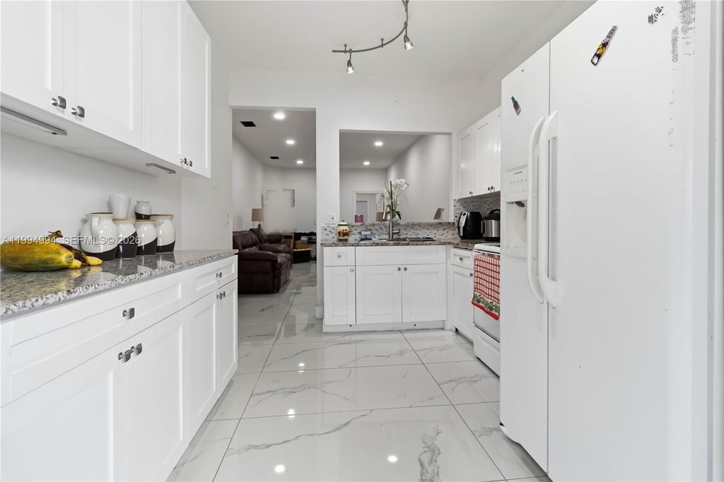 Photo of 64 SW 15th Ter, Homestead, FL 33030 (MLS # A11994994)