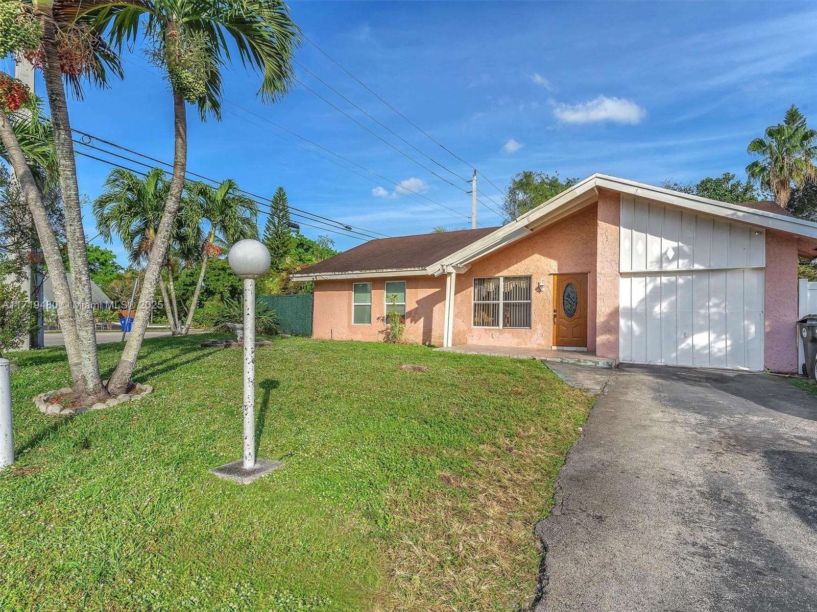 Discover the charm of this spacious pool home in North Lauderdale, great for creating your ideal living space. This 4-bedroom, 2-bathroom property offers versatile living options, including a converted 1-car garage that serves as a cozy family room or office. Enjoy the sun-filled sunroom and a small shed by the pool for added storage. The fenced backyard provides privacy and plenty of space for outdoor activities or gatherings. This home offers easy access to local amenities, parks, shopping, and major roadways. Whether you're lounging by the pool or exploring the neighborhood, this home is a blend of comfort and convenience. Don’t miss the opportunity to make this charming property your own. Schedule a showing today—homes like this won’t last long!