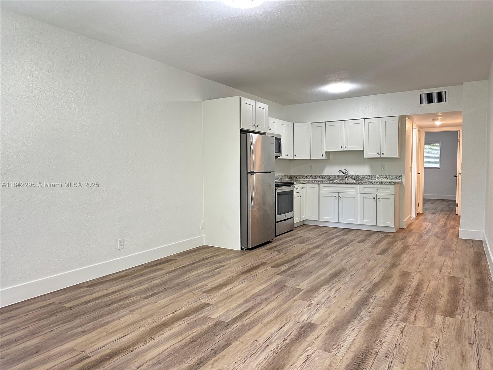 NEWLY REMODELED 1 BEDROOM 1 BATH APARTMENT IN BEAUTIFUL COMPLEX! This 1st floor unit is spacious and features new wood flooring, new lighting, new appliances + kitchen and bathroom upgrades. Also includes central AC, impact windows and 1 parking space right in front of the property. Property is beautiful and well-maintained. Laundry is onsite. Water, waste, sewer included in rent as well as pest control and maintenance. Pets welcome with small, 1x non-refundable pet deposit. Centrally located, walking distance to parks, schools, shops, restaurants, and close to Downtown Hollywood, Downtown Hollywood Art Walk, Hollywood Beach Golf Club, Young Circle Park, Major highways such as A1A, US1, I-95 etc. 10 mins from Hollywood Beach. Great location, nestled on a quiet street yet close to it all!