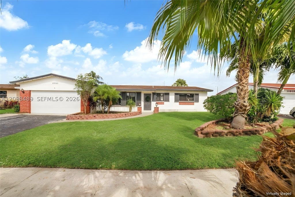 Photo of 11941 NW 23rd St, Pembroke Pines, FL 33026 (MLS # A12098489)