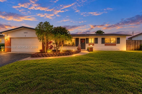 Photo of 11941 NW 23rd St, Pembroke Pines, FL 33026 (MLS # A12098489)