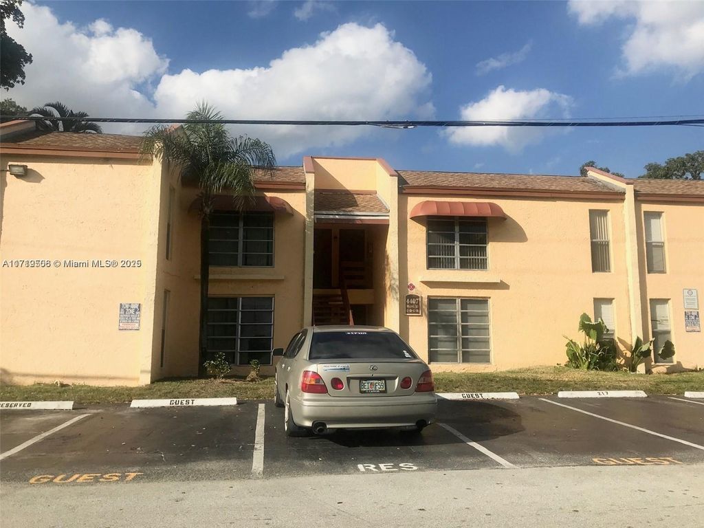 Photo of 4407 Treehouse Ln #G, Tamarac, FL 33319 (MLS # A11719506)