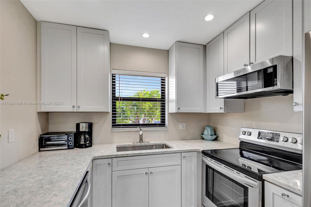 Photo of 755 Saturn St #G202, Jupiter, FL 33477 (MLS # A11584486)