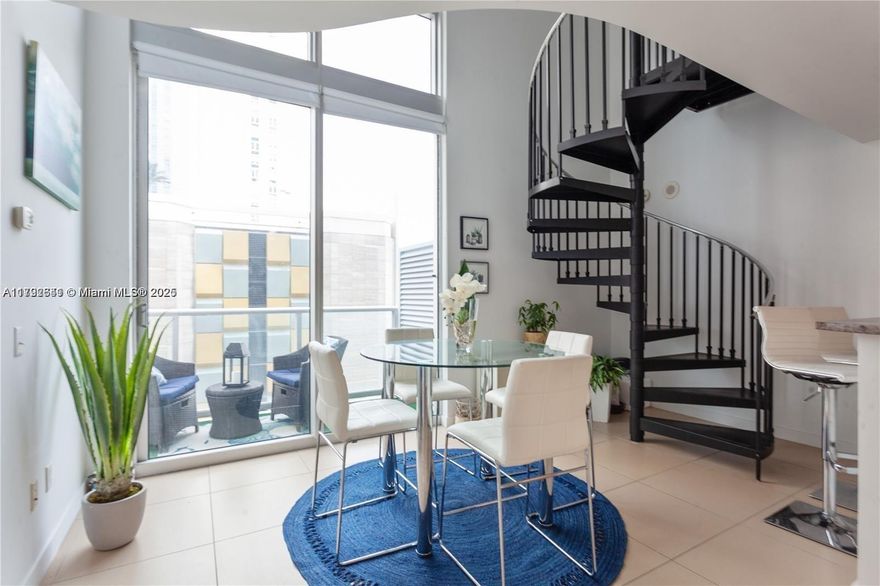 LIVE LIMITLESSLY IN A MODERN FULLY RENOVATED 2-STORY LOFT IN THE BEST PART OF DOWNTOWN MIAMI.THE BRIGHT AND OPEN FLOOR PLAN FEATURES 18" FLOOR-TO-CEILING
 WINDOWS, A PRIVATE TERRACE, AND A HOME OFFICE SPACE.A HALF-BATH IS CONVENIENTLY DOWNSTAIRS FOR GUESTS, WHILE THE MASTER SUITE UPSTAIRS HAS A PRIVATE FULL BATH, WALK-IN CLOSET, AND A LAUNDRY WITH WASHER & DRYER. RESORT STYLE AMENITIES INCLUDE FITNESS CENTER, POOL, HOT-TUB, 24 HR CONCIERGE, VALET PARKING, BUSINESS CENTER, KIDS ROOM.PLUS, AVOID THE TRAFFIC WITH THE METRO MOVER RIGHT NEXT DOOR AND A BACK ROAD SHORTCUT TO THE HIGHWAY. BAYFRONT PARK ACROSS THE STREET. WALK TO MARKETS, COFFEE SHOPS, STORES, BANKS, AND PHARMACIES. 15 MIN TO SOUTH BEACH, MIA AIRPORT. PETS OK. 2(!)ASSIGNED PARKING SPACES. PERFECT FOR INVESTORS: SOLD WITH TENANT.