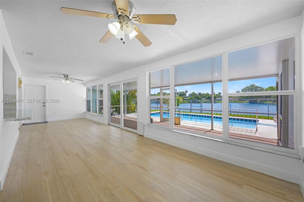 Photo of 2320 NW 73rd Ave, Sunrise, FL 33313 (MLS # A11996871)