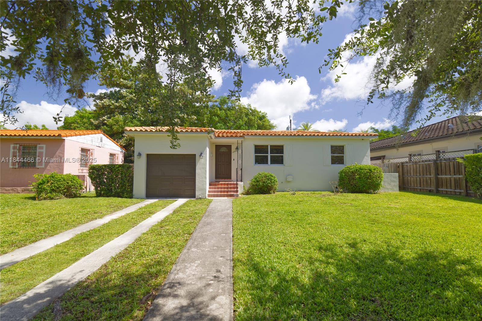 Charming single family home in the sought after neighborhood of Coral Gate. This home is nestled on. winding oak tree lined street. All newly re-surfaced wood floors that gives this home the warmth and character lost years ago. Walking through the abundant natural light filling every room. The oversized family room for entertaining and large primary bedroom with his and hers walk-in closets a rare find for this neighborhood as well as walk-in closets in the second bedroom for lots of modern-day storage. The backyard has full grown Mango and Avocado trees with plenty of shade for BBQ to keep you cool during our summer months. There is room for a pool. Add your final touches to the kitchen and bathrooms and make this a forever home