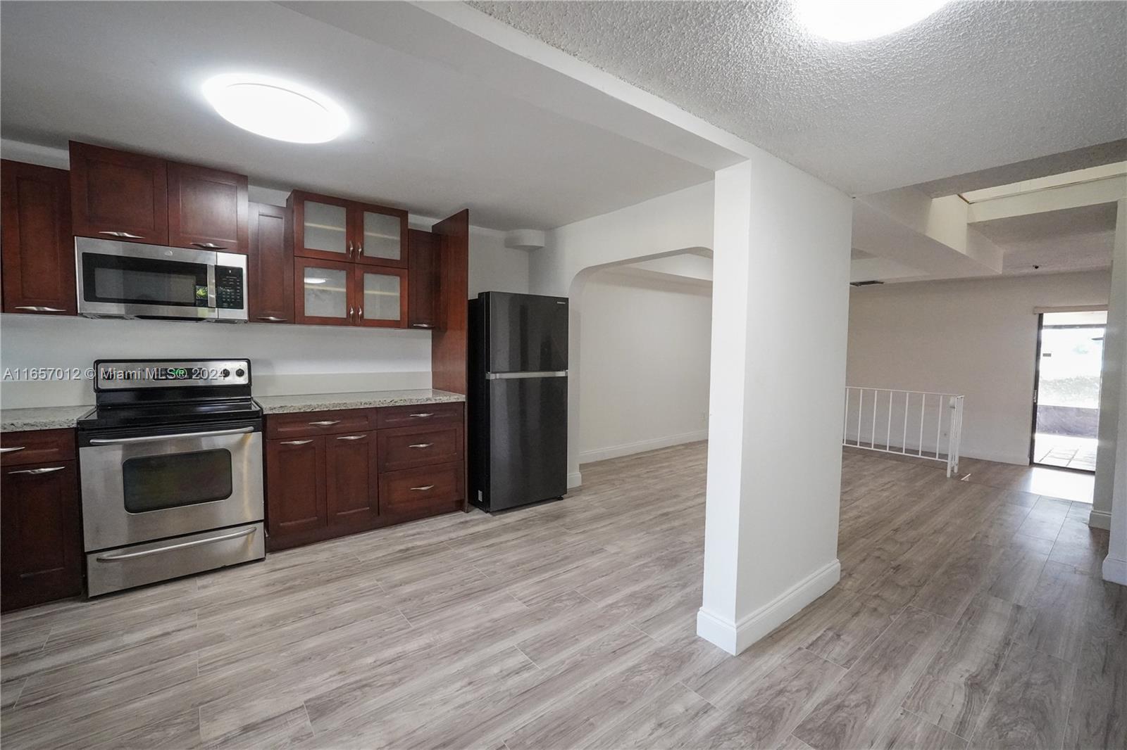 Tenant occupied until March 2026. This stunning 3-bedroom, 2.5-bathroom corner unit offers breathtaking lake views and an unbeatable location near top restaurants and a shopping mall. Brand new floors, freshly painted, updated kitchen! The spacious primary bedroom features a walk-in closet, and the screened-in patio is perfect for enjoying the serene surroundings. Built for comfort and convenience, this home boasts a 2020 roof and access to fantastic community amenities, including pools, a gym, tennis courts, and a clubhouse. Don't miss the opportunity to make this beautiful property your own!