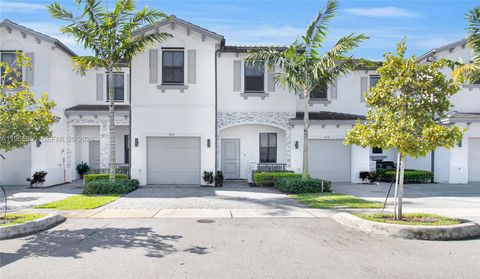 Photo of 656 NW 203rd Ter, Miami Gardens, FL 33169 (MLS # A11965859)