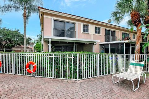 Photo of 9715 NW 23rd Ct, Pembroke Pines, FL 33024 (MLS # A11838404)