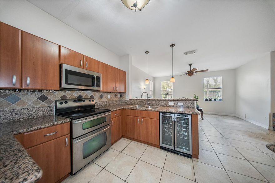 Discover elegant living in this impressive 4-bedroom, 2 Full baths 1 half bath home located in the sought-after Crestview community within Richmond West! Built in 2002, this stunning 2,546 sq ft single-family home welcomes you with a dramatic double-height ceiling entry that creates an immediate sense of grandeur. Situated on a generous 5,426 sq ft lot, this well-designed home offers spacious family living with room to grow. The Crestview neighborhood is known for its family-friendly atmosphere, well-maintained streets, and strong sense of community - making it perfect for those seeking suburban tranquility in Southwest Miami. Located in established Kendall Country Estates area with easy access to excellent schools, shopping, dining, and major highways.