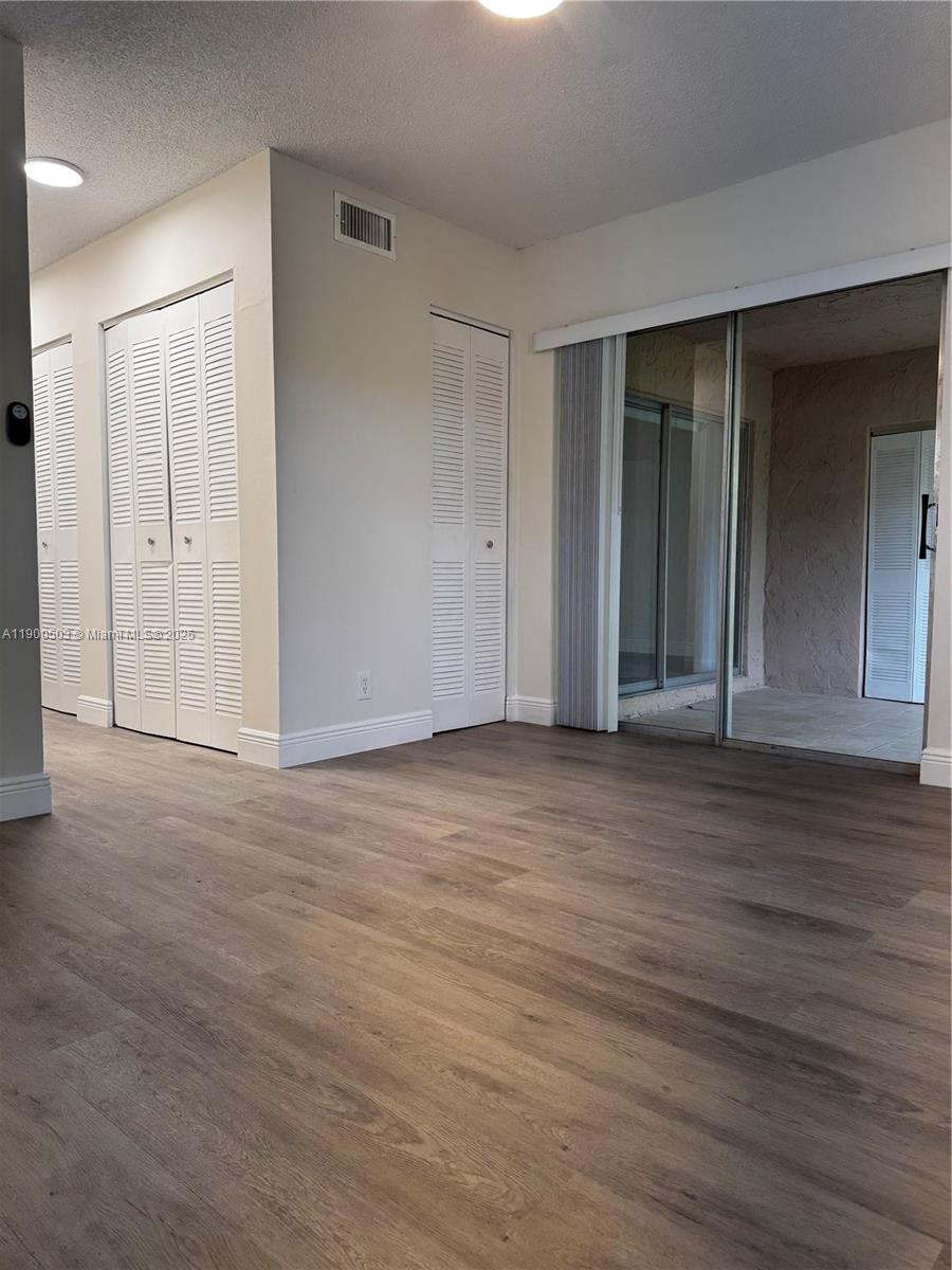 WOOD HUE IV CONDO - Residential Lease