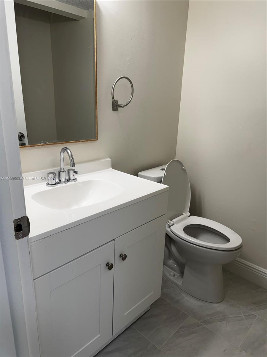 WOOD HUE IV CONDO - Residential Lease