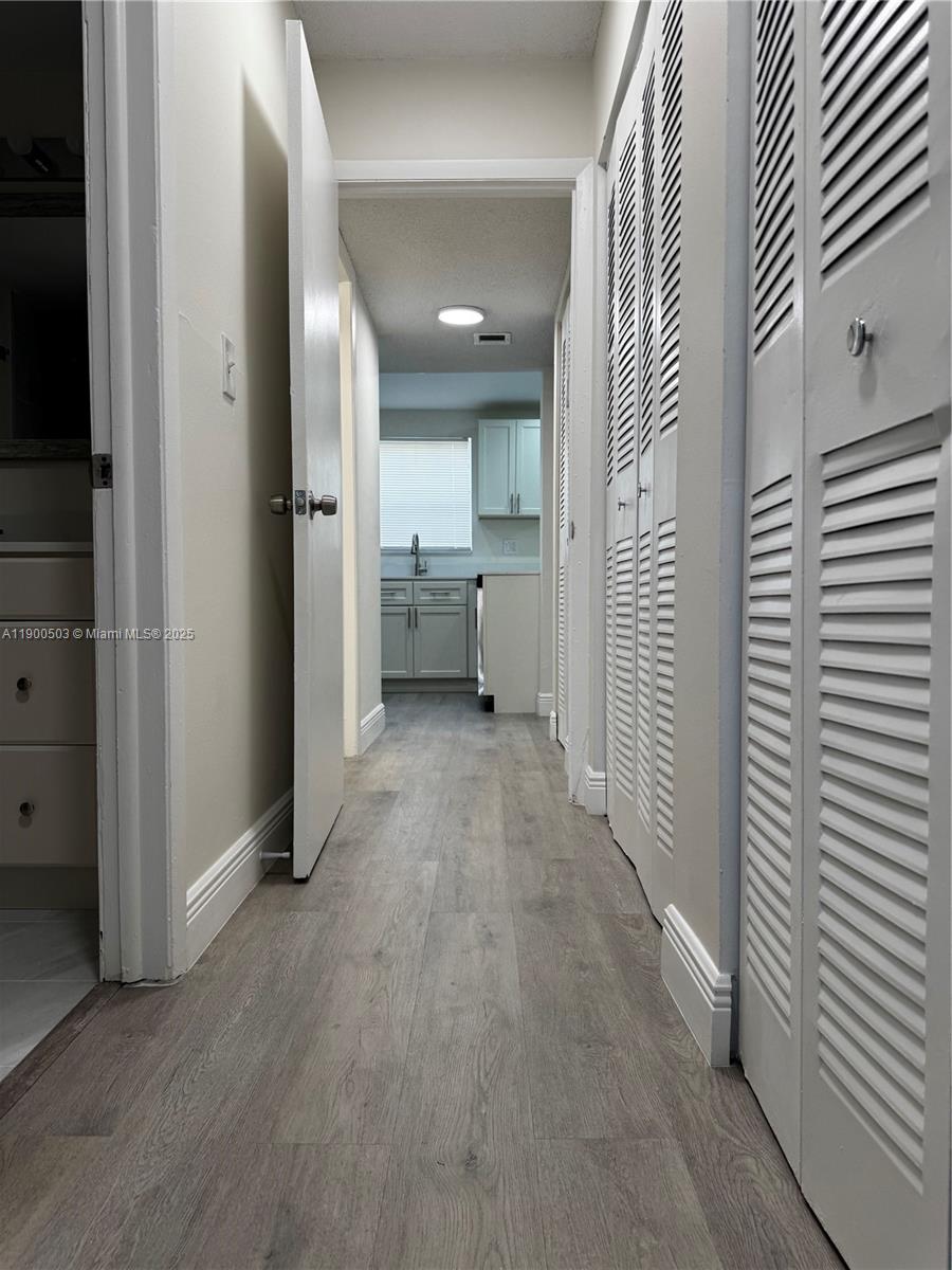 WOOD HUE IV CONDO - Residential Lease