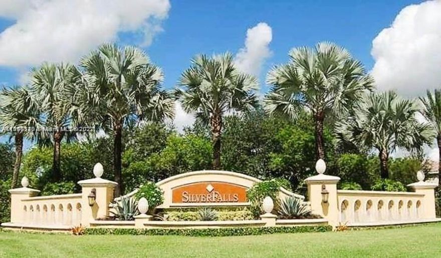 Gorgeous Condo 3/2 located in the community of Silver Falls. All ceramic tile floors with a spectacular view of the lake and garden from the master bedroom, living room and kitchen. Attached garage for 1 car and 2 more spaces outside. Has a pool, fitness room, kids palyground, tennis and basketball courts.  Nice place in Miramar!!!  Great Opportunity!!!!