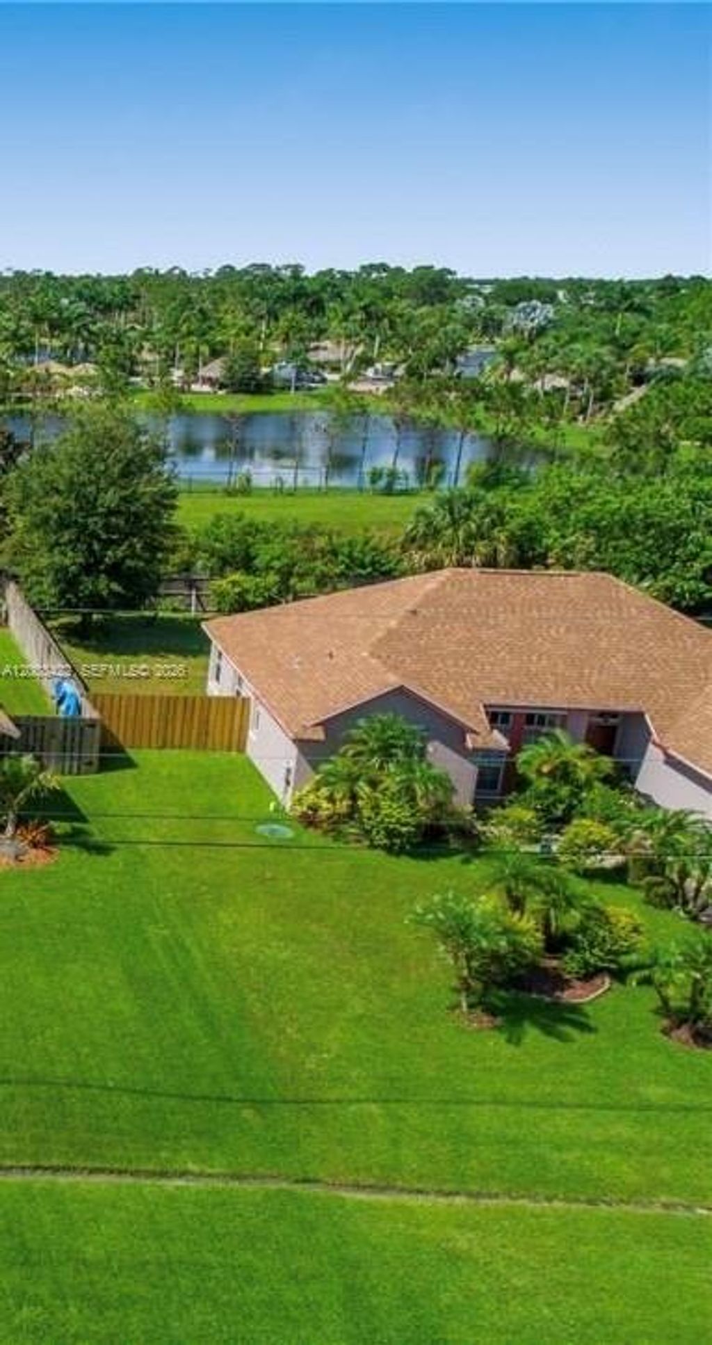 Photo of 6030 NW Wolverine Rd, Port St Lucie, FL 34986 (MLS # A12003422)