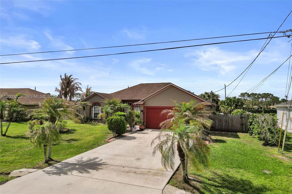 Photo of 6030 NW Wolverine Rd, Port St Lucie, FL 34986 (MLS # A12003422)