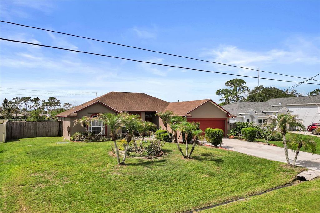 Photo of 6030 NW Wolverine Rd, Port St Lucie, FL 34986 (MLS # A12003422)