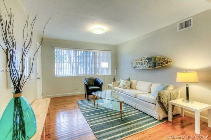 This is an amazing opportunity for your tenants. This property has it all: Location, Price and Condition. Located in beautiful North Beach just minutes to the fabulous sands and warm waters of Miami Beach. 2 bedroom 1 bath apartment in move in condition with remodeled Kitchen with granite counters and stainless steel appliances. No pets. Original gleaming wood floor throughout. Washer  & Dryer inside. Very easy to show. Unit vacant!