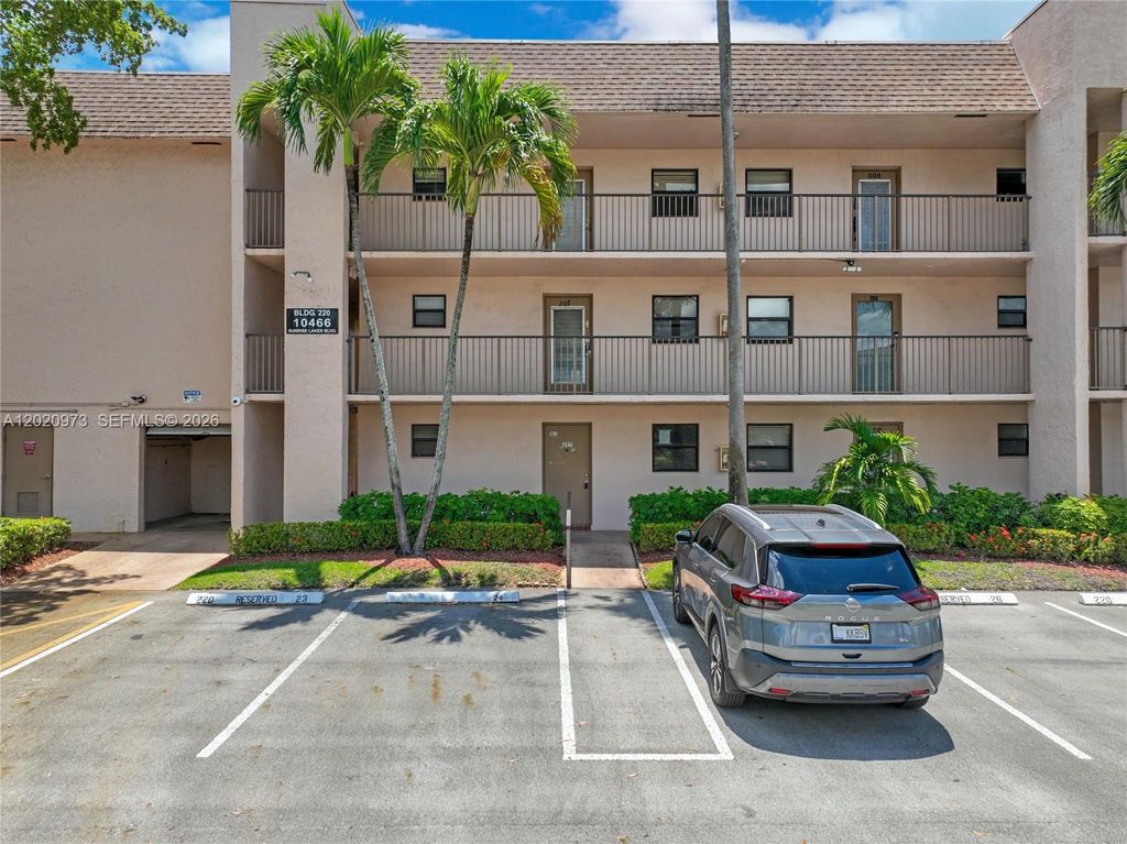 Photo of 10466 Sunrise Lakes Blvd #107, Sunrise, FL 33322 (MLS # A12020973)