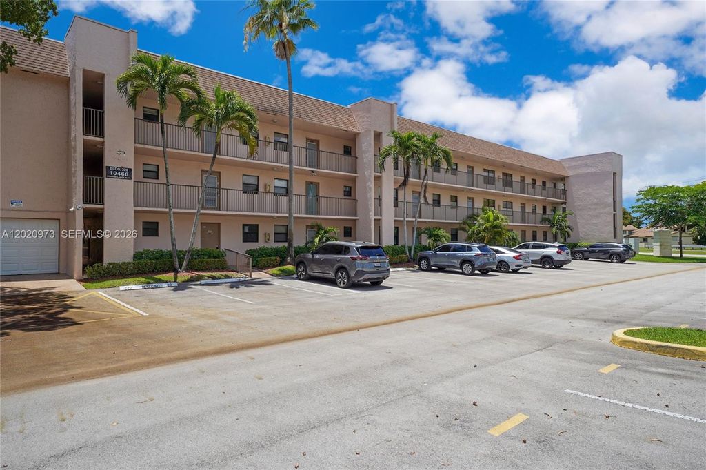 Photo of 10466 Sunrise Lakes Blvd #107, Sunrise, FL 33322 (MLS # A12020973)