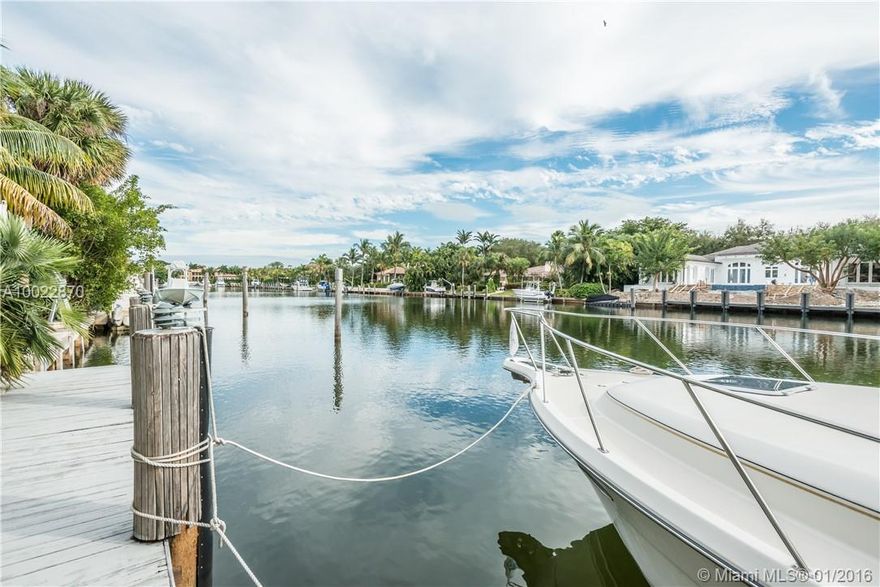 Exceptional waterfront opportunity in sought after Old Cutler Bay. One story 3,849 sf home on 20,300 sf lot with 140 ft on wide canal. 80 ft private dock. No bridges to bay. Enjoy & live as-is or renovate/build. Split floorplan with 5 bed & 4.5 baths. Kitchen, living room & dining room with wall of sliding glass doors that provide inviting views of the patio, pool & waterway. 2 Car Garage. Close to the best schools. A fantastic Coral Gables address in a gated community with private patrol