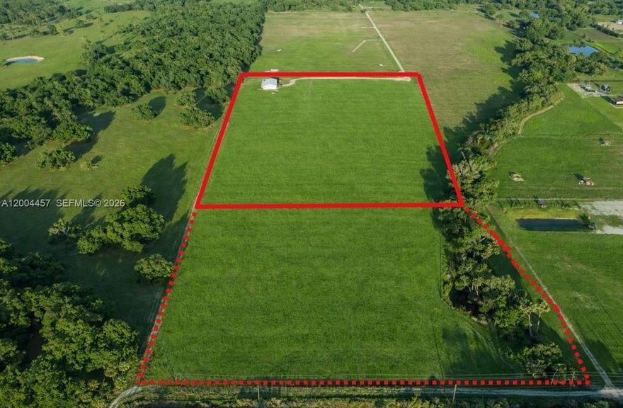 Secluded and full of potential, this beautiful 10-acre tract offers the perfect opportunity to create your ideal country lifestyle. Whether you envision a custom BARNDOMINIUM, small farm, or private rural retreat, this property is already well on its way.
Originally started as a pole barn, the existing structure is constructed on an 8-inch slab, providing a strong foundation for future completion. The unfinished building already features a durable metal Galvalume roof and hurricane-impact windows. With county permitting, it can be finished to suit your needs as a custom home, BARNDOMINIUM, barn, or workshop.
The land is fully fenced and currently supports cattle, with an agricultural exemption already in place to help keep property taxes low. A 3-inch well is installed and set up for solar power, with only a submersible pump needed to provide water to a future residence or barn. There is also a holding tank for an RV, allowing you to stay on-site while completing construction or managing agricultural use.
Ideally located in LaBelle and close to Alva, the property offers peaceful country living with convenient access to rural LaBelle and downtown Fort Myers. Located only about 5± miles from the Lee/Hendry County line, it provides easy access to schools, shopping, and commuting routes.
Adjoining 10 acres also available: ML# 2026017669.