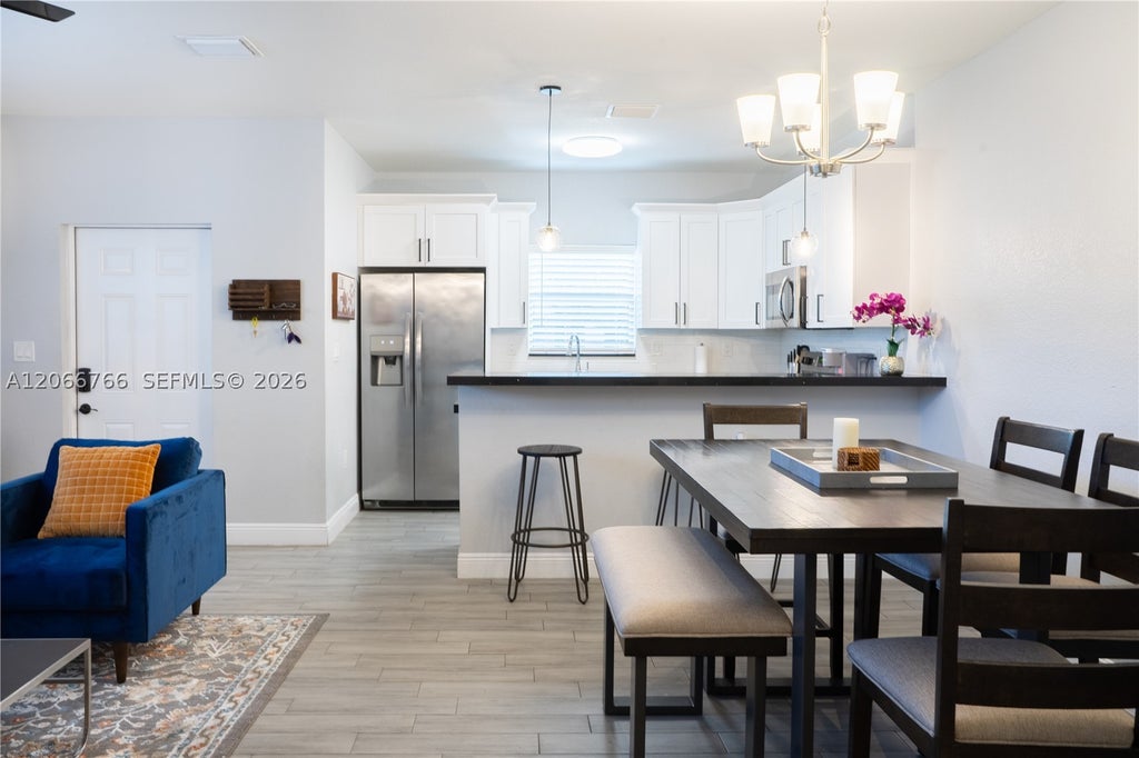 Photo of 837 NW 14th Way, Fort Lauderdale, FL 33311 (MLS # A12066766)