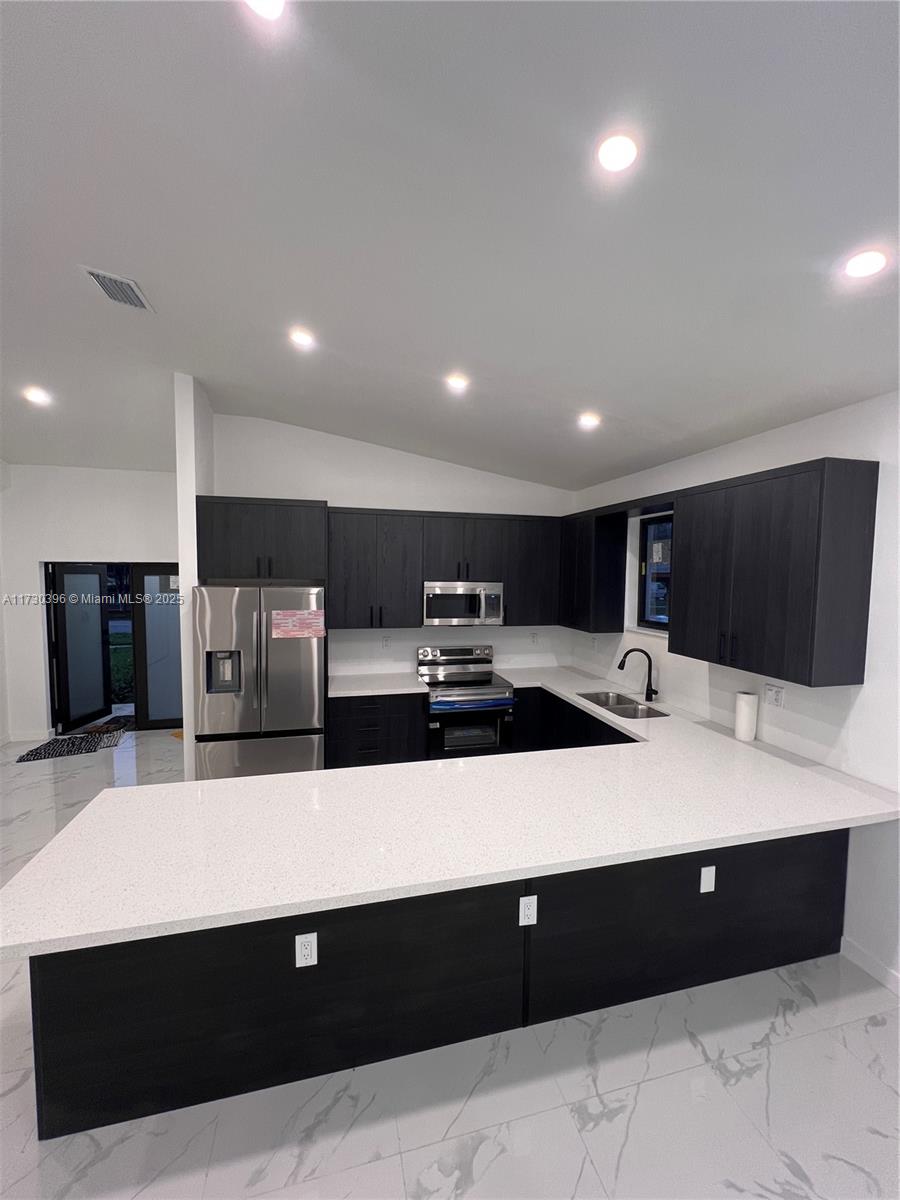 335 NW 15th St
