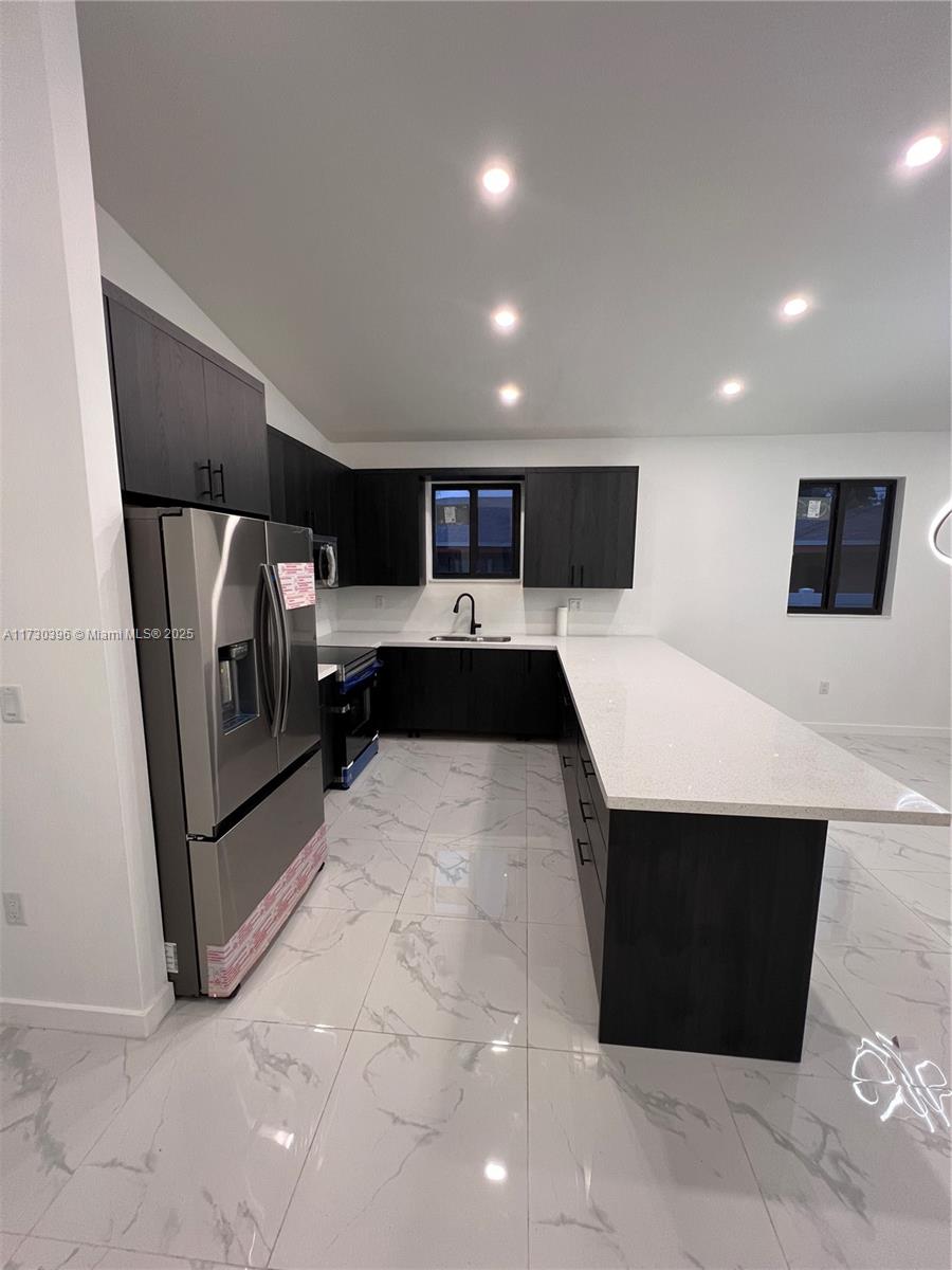 335 NW 15th St