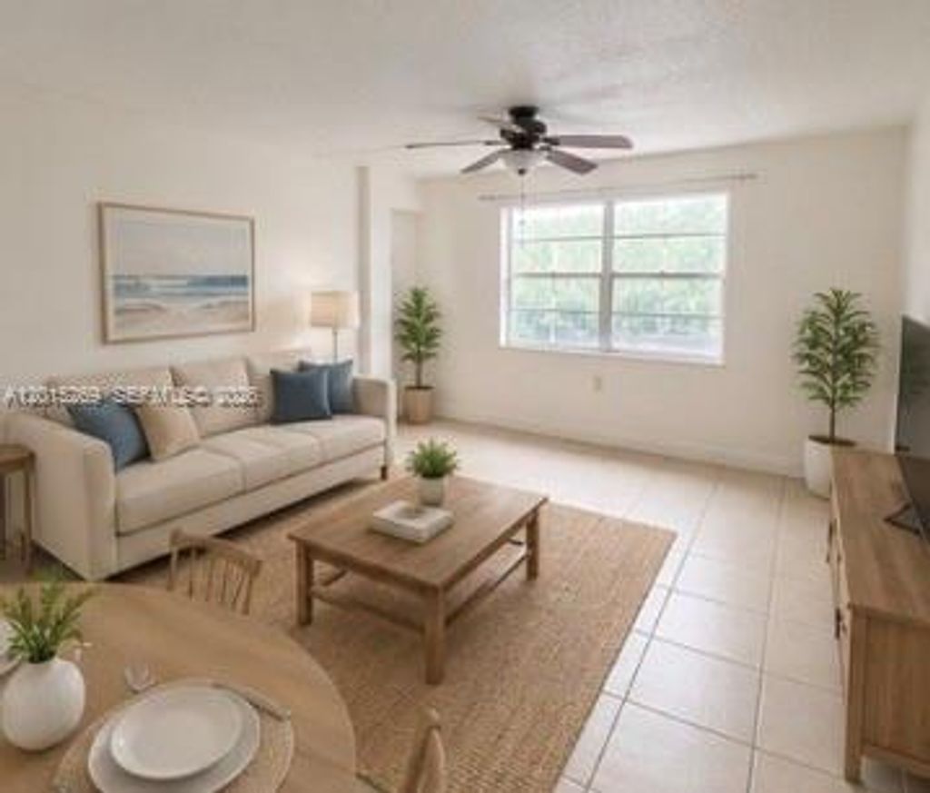 Photo of 4304 NW 9th Ave #3-2H, Deerfield Beach, FL 33064 (MLS # A12015269)