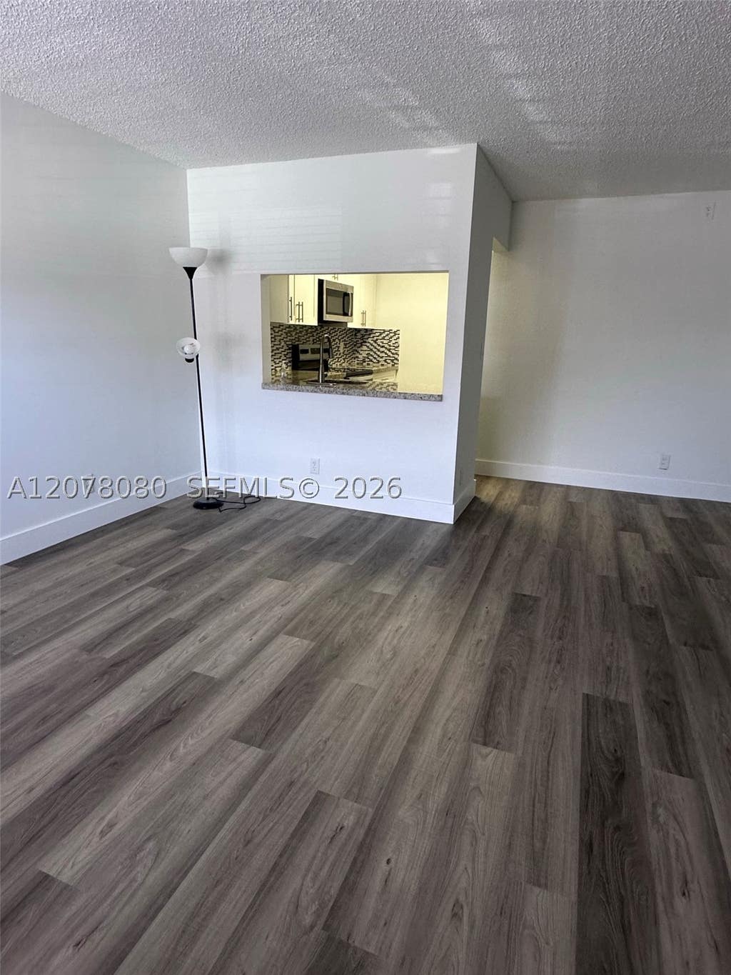 Photo of 10049 Winding Lake Rd #103, Sunrise, FL 33351 (MLS # A12078080)